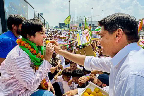 Congress leader Deepender Hooda offers sweets to wrestler Vinesh Phogat